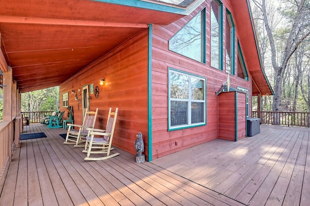 wooden terrace featuring central air condition unit