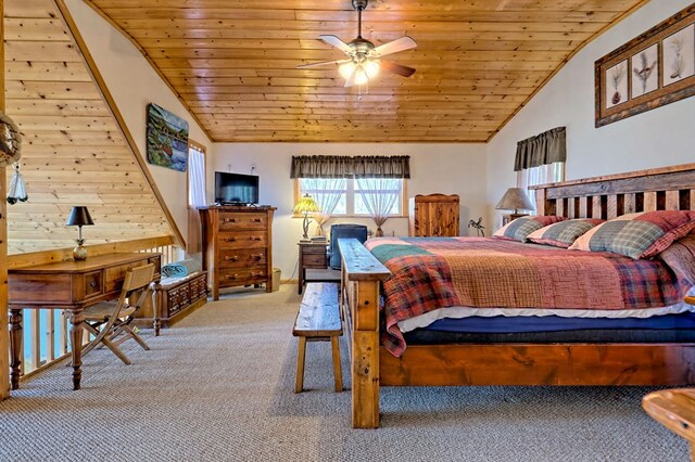 carpeted bedroom featuring wooden ceiling and lofted ceiling