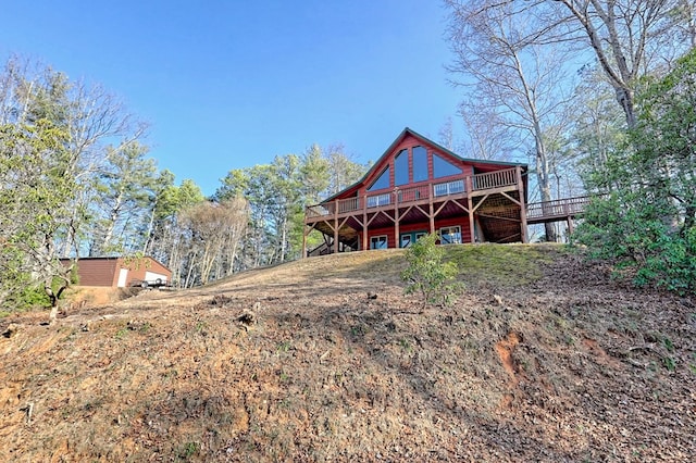 rear view of house with a deck