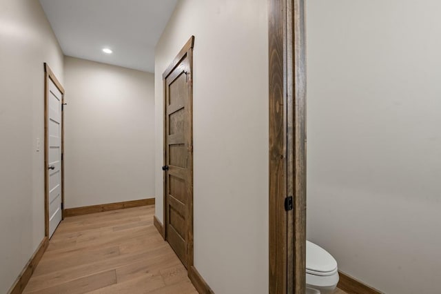 hallway featuring light wood-type flooring