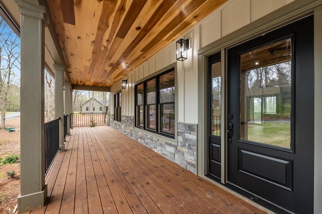 wooden terrace with covered porch