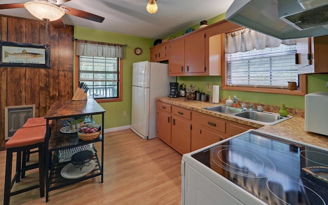 5557 Joe Brown Hwy, Murphy, NC 28906 - kitchen with electric range, freestanding refrigerator, a sink, and light countertops