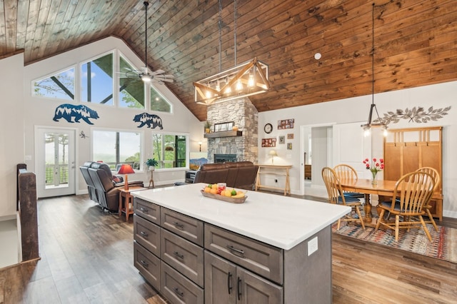 774 Hickory Ridge Dr, Ellijay, GA 30540 - kitchen with a ceiling fan, a fireplace, open floor plan, and high vaulted ceiling