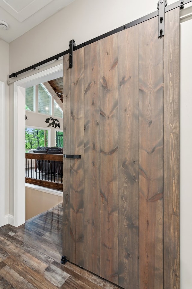 774 Hickory Ridge Dr, Ellijay, GA 30540 - interior space with a barn door and wood finished floors