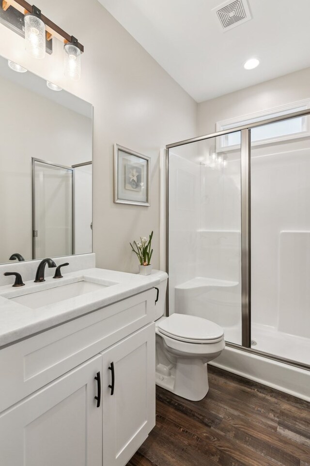 774 Hickory Ridge Dr, Ellijay, GA 30540 - bathroom featuring a shower stall, wood finished floors, and visible vents
