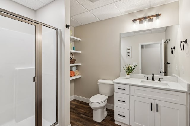 774 Hickory Ridge Dr, Ellijay, GA 30540 - bathroom with wood finished floors, a paneled ceiling, a stall shower, and toilet