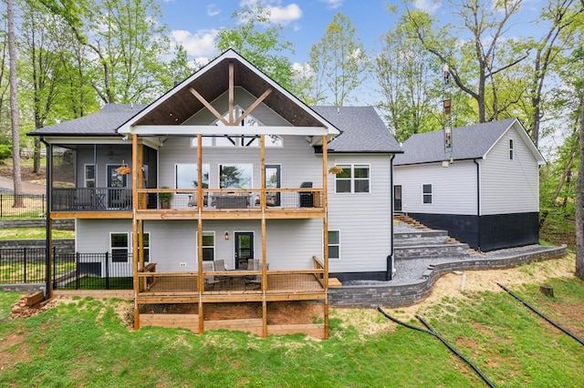 774 Hickory Ridge Dr, Ellijay, GA 30540 - rear view of house featuring a yard, a balcony, and fence