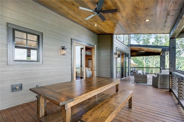 wooden deck featuring ceiling fan, outdoor dining area, and outdoor lounge area