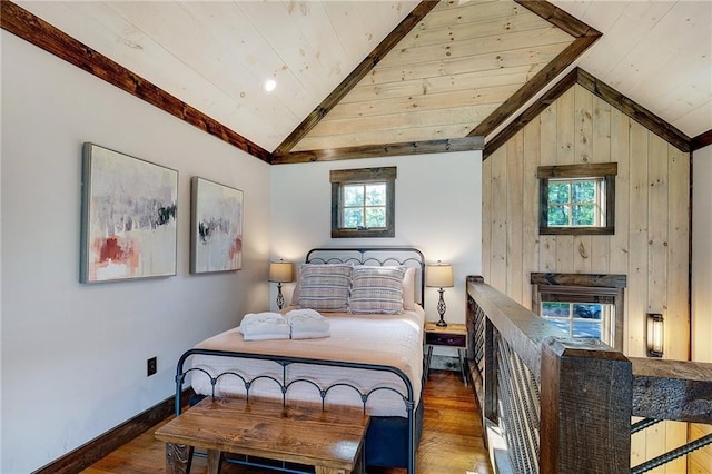 bedroom featuring dark wood-style floors, wooden ceiling, vaulted ceiling, and baseboards