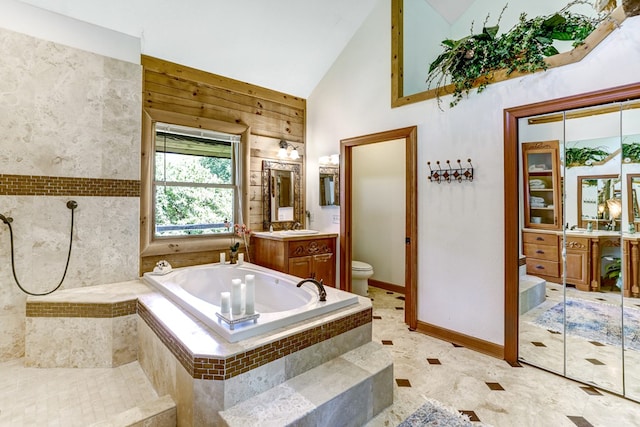 full bathroom with vanity, high vaulted ceiling, independent shower and bath, and toilet