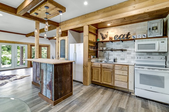 kitchen with light hardwood / wood-style flooring, sink, backsplash, and white appliances