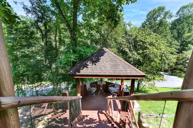 wooden deck featuring a gazebo