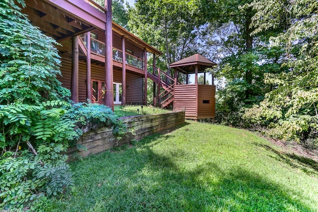 view of yard with a wooden deck