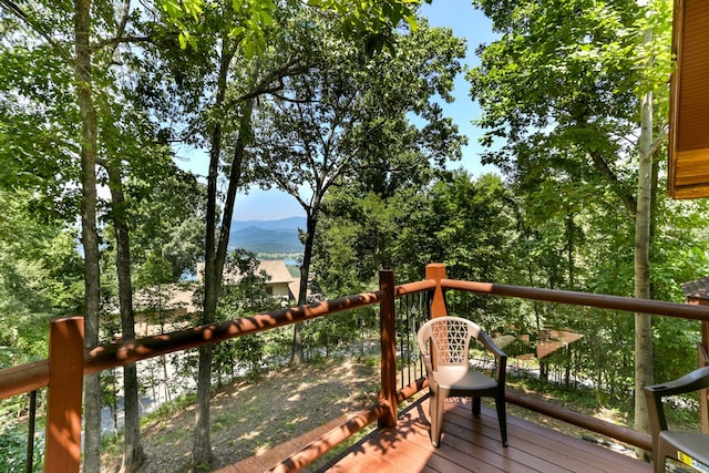 wooden terrace with a mountain view