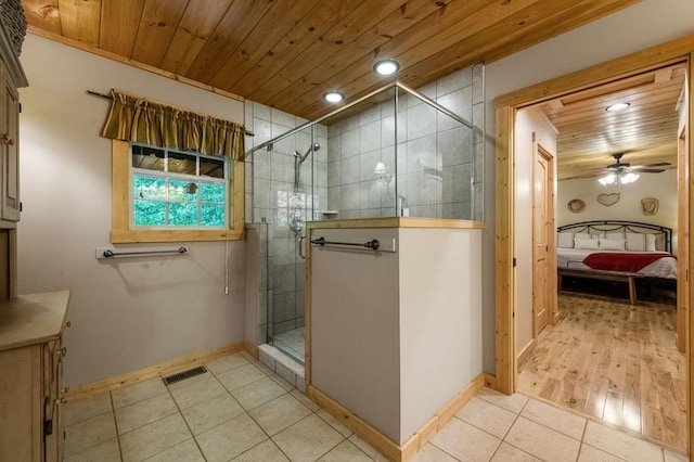 bathroom featuring an enclosed shower, wood ceiling, vanity, ceiling fan, and hardwood / wood-style flooring