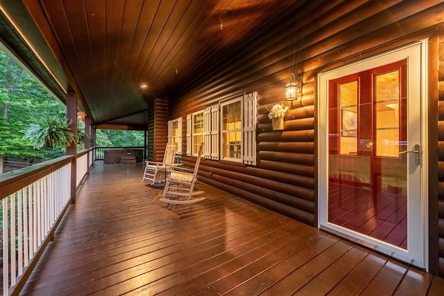 wooden terrace featuring a porch