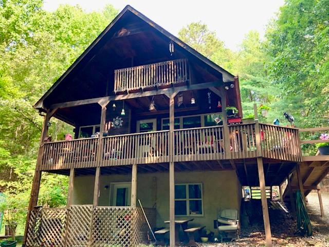 147 Blair Oaks Dr, Blairsville, GA 30512 - back of property with a deck and a balcony
