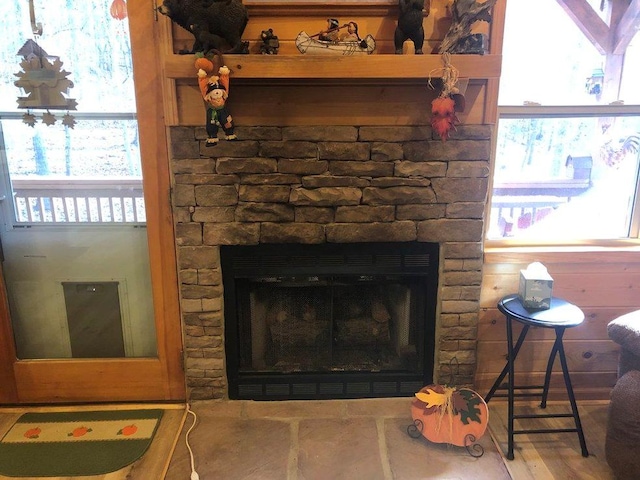 room details featuring a stone fireplace