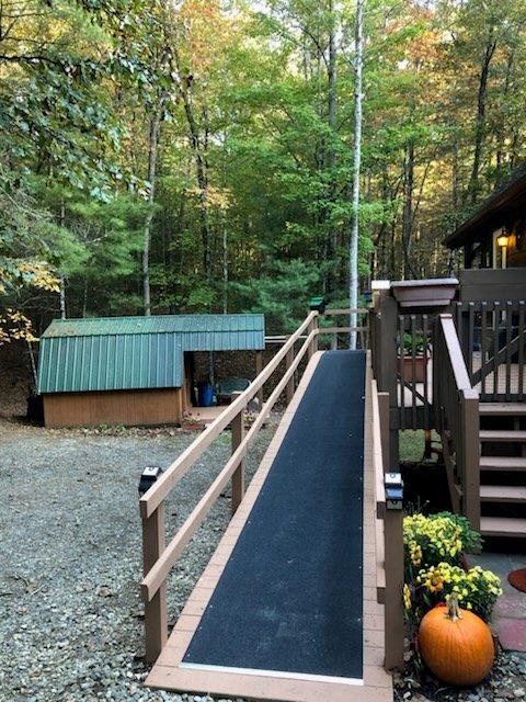 147 Blair Oaks Dr, Blairsville, GA 30512 - deck featuring stairway and a wooded view