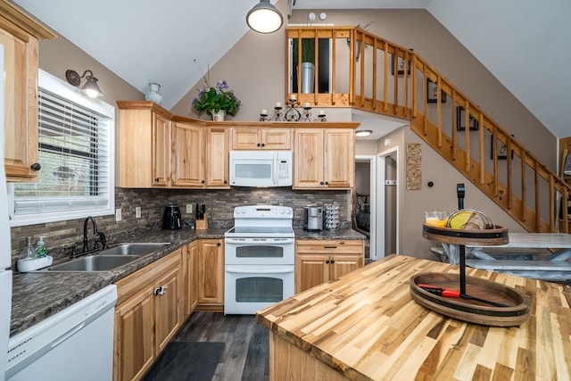 kitchen featuring tasteful backsplash, a sink, dark wood-style floors, butcher block counters, and white appliances