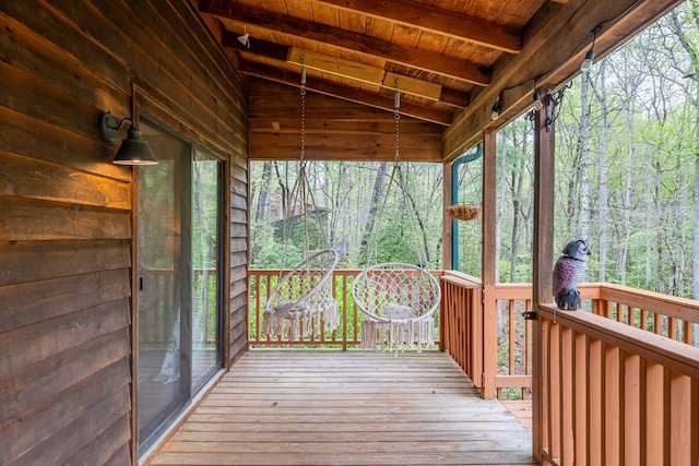 deck featuring a view of trees