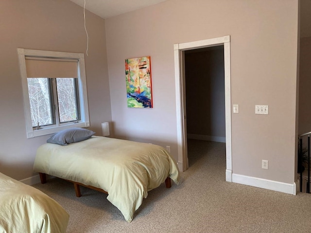 bedroom with light carpet