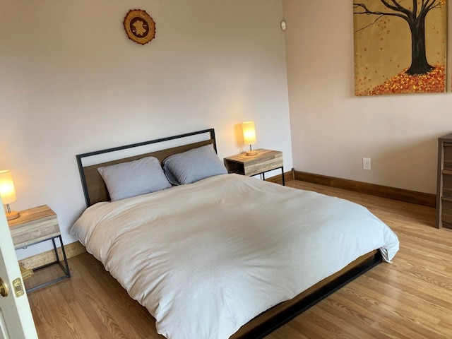 bedroom featuring light hardwood / wood-style floors