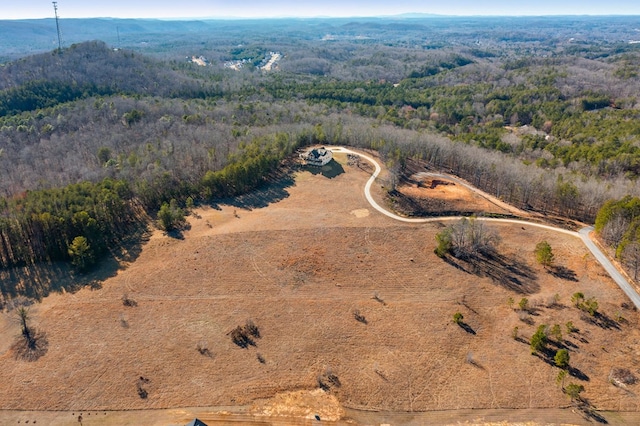 drone / aerial view with a view of trees