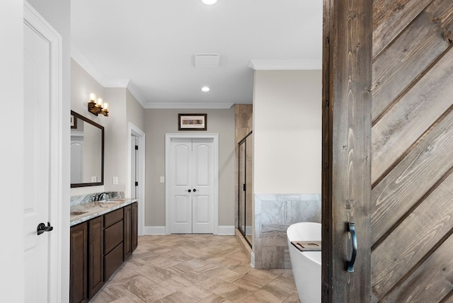 bathroom featuring crown molding, a freestanding bath, recessed lighting, a stall shower, and vanity