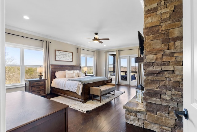 bedroom featuring recessed lighting, access to exterior, dark wood-type flooring, french doors, and crown molding