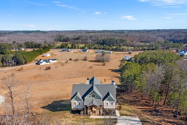 drone / aerial view with a forest view