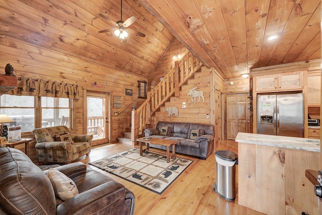 living area featuring stairs, wood ceiling, and light wood-type flooring