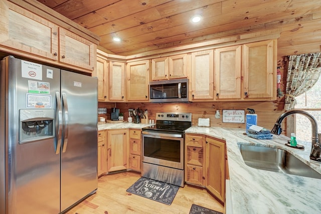 kitchen with light brown cabinetry, light wood-type flooring, wooden ceiling, stainless steel appliances, and a sink