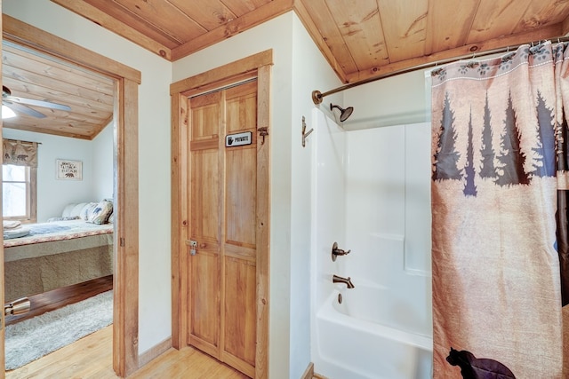 full bathroom featuring shower / tub combo with curtain, wood finished floors, connected bathroom, wood ceiling, and ceiling fan