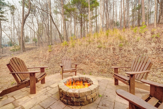 view of patio / terrace featuring a fire pit