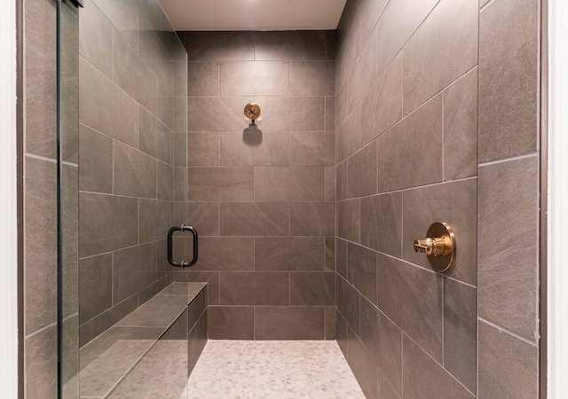 bathroom featuring an enclosed shower