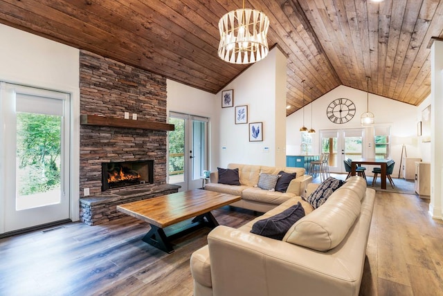 living room featuring high vaulted ceiling, wood-type flooring, wooden ceiling, and french doors