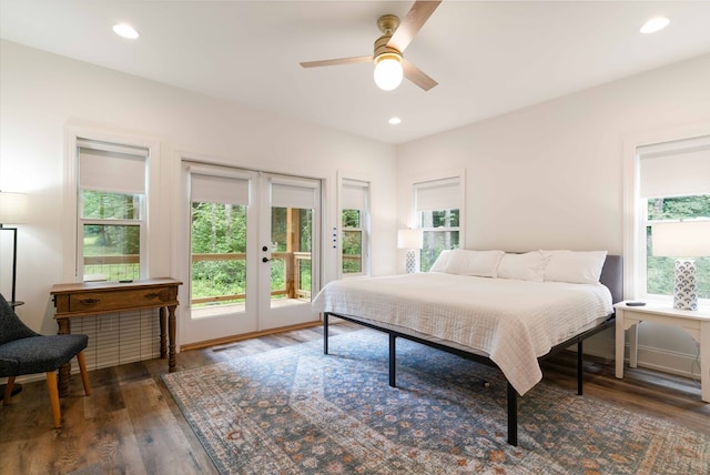 bedroom featuring french doors, ceiling fan, dark hardwood / wood-style floors, and access to outside