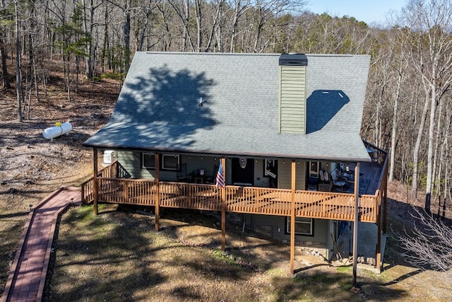 view of front of house featuring a wooden deck