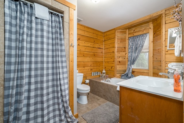 full bath featuring a shower with shower curtain, wooden walls, tiled tub, tile patterned floors, and toilet