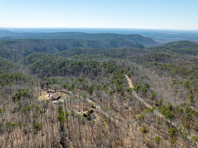 bird's eye view featuring a view of trees and a mountain view