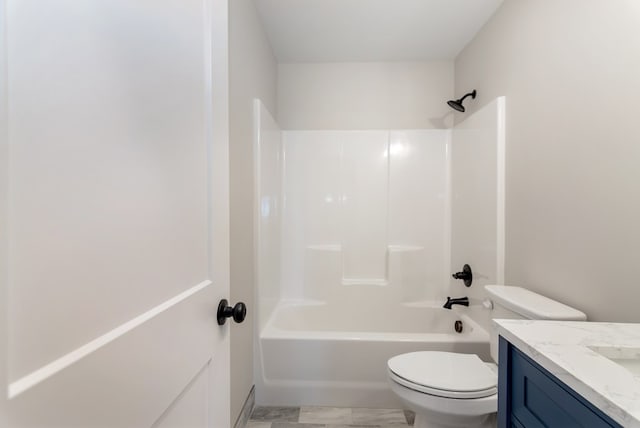 full bathroom with vanity, toilet, and bathing tub / shower combination