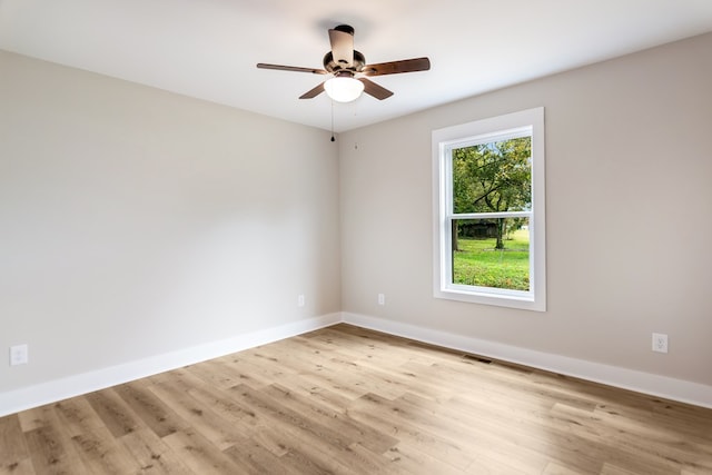 unfurnished room with light hardwood / wood-style floors and ceiling fan