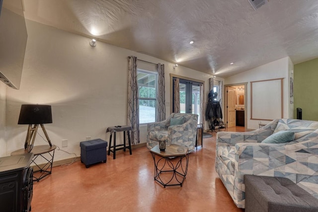 1529 Cedar View Ln, Hiawassee, GA 30546 - living room featuring french doors, finished concrete floors, and lofted ceiling