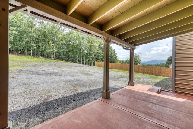 1529 Cedar View Ln, Hiawassee, GA 30546 - deck featuring a mountain view, a wooded view, and a patio area