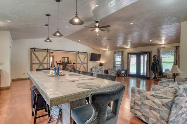 1529 Cedar View Ln, Hiawassee, GA 30546 - dining room with a barn door, vaulted ceiling, and a ceiling fan