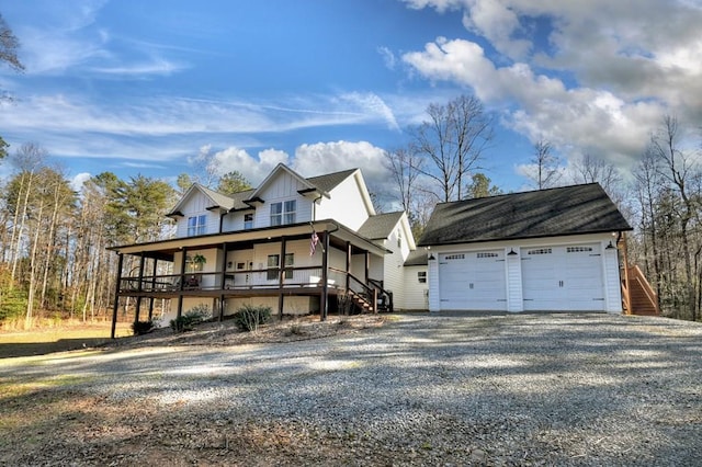 view of front of house with a garage and covered porch