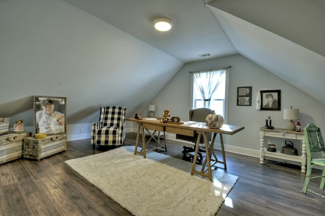 office with vaulted ceiling and dark hardwood / wood-style flooring