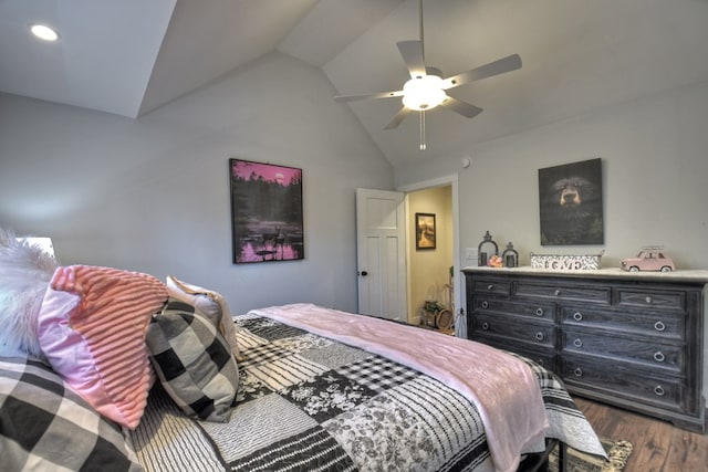 bedroom with lofted ceiling, dark hardwood / wood-style floors, and ceiling fan