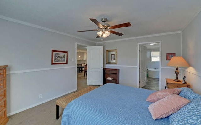 bedroom featuring connected bathroom, carpet flooring, crown molding, and baseboards